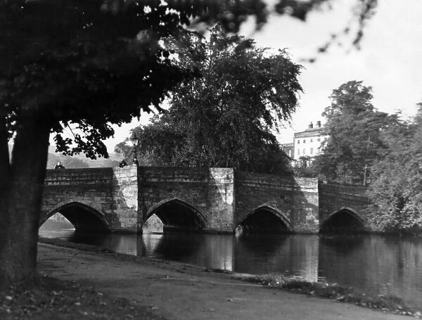 View of the old bridge which crosses the River Wye in Bakewell, Derbyshire