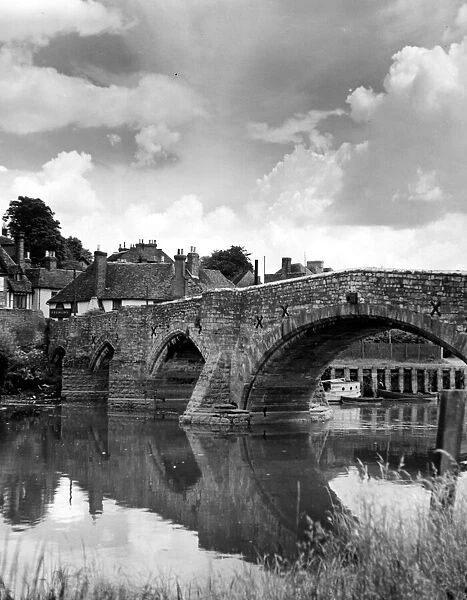 View showing an old bridge crossing the river Medway in the village of Aylesford