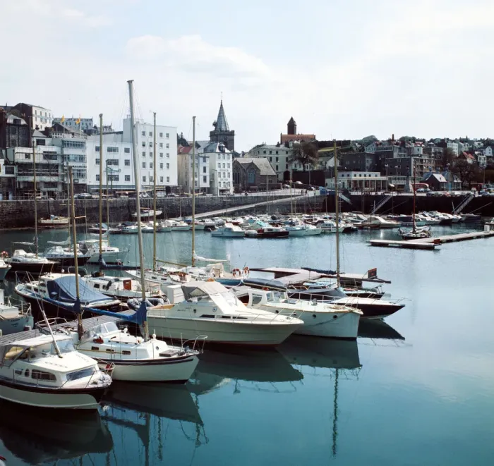 Framed Print : A view of St Peter port harbour on the island of Guernsey, Channel Islands Framed Print : A view of St Peter port harbour on the island of Guernsey, Channel Islands