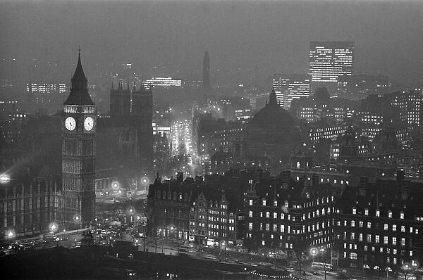 Views from the South Bank at night showing Big Ben. 13th December 1963
