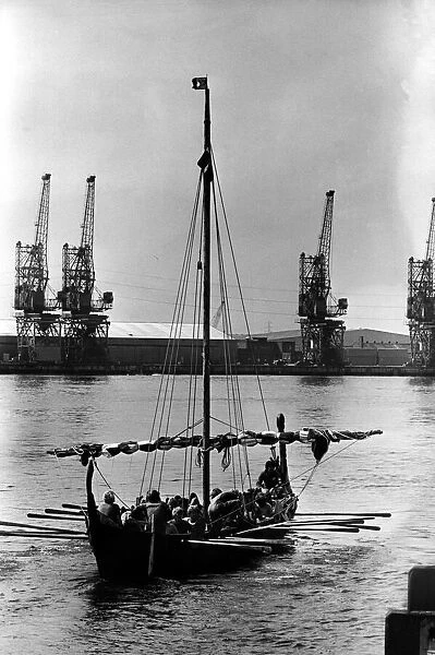 A Viking long ship miakes it way up the river Tyne on 21st July 1980