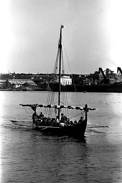 A Viking longboat arriving on the river Tyne for the Newcastle Regatta in July 1980