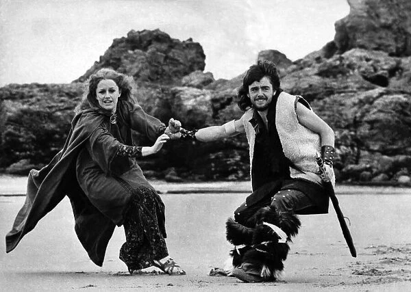 Viking Peter Towers captures a wench on a beach on 10th August 1973