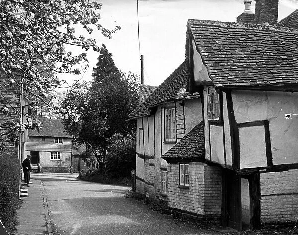Village road in Sittingbourne, Kent showing the cottage housing Circa 1950