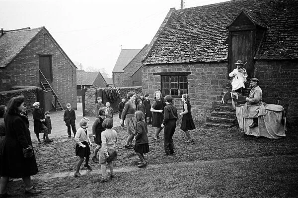 Villagers dance to the Ilmington Fiddler, Warwickshire. Circa 1945