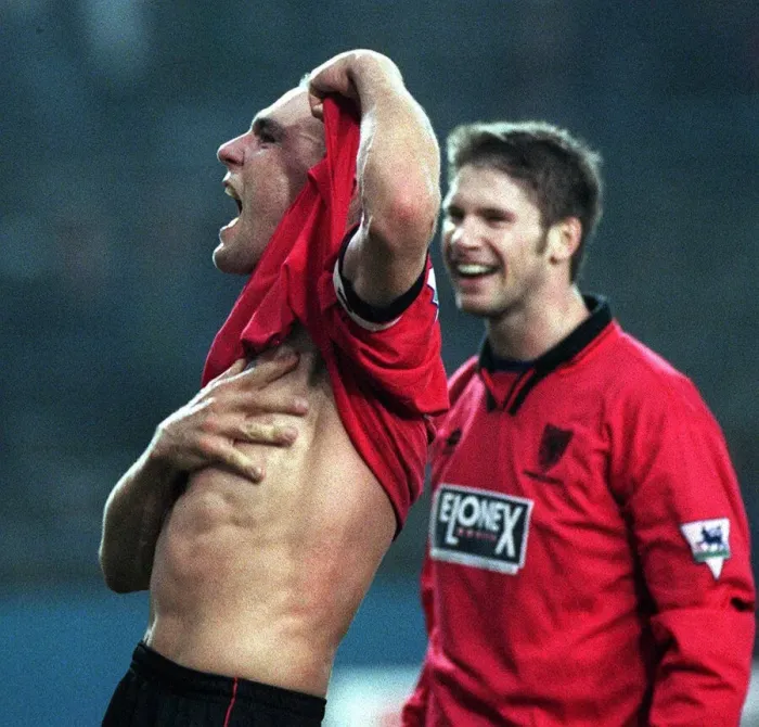 Framed Print : Vinnie Jones celebrates by lifting his shirt and putting his hand across his chest after Framed Print : Vinnie Jones celebrates by lifting his shirt and putting his hand across his chest after