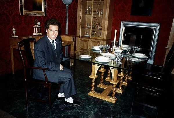Viscount Linley sits at dining table