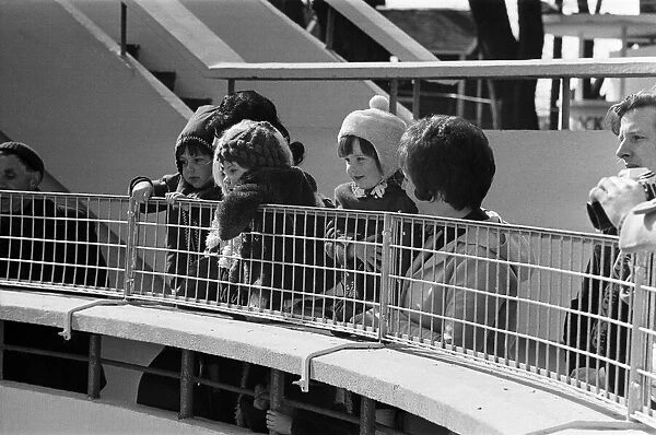 Visitors to Dudley Zoo, looking at the polar bears, West Midlands. 10th April 1973