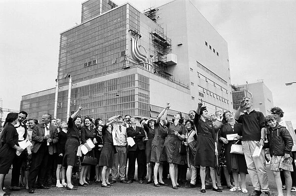 Visitors are given a tour of the new power station at Dungeness, Kent. 10th August 1966