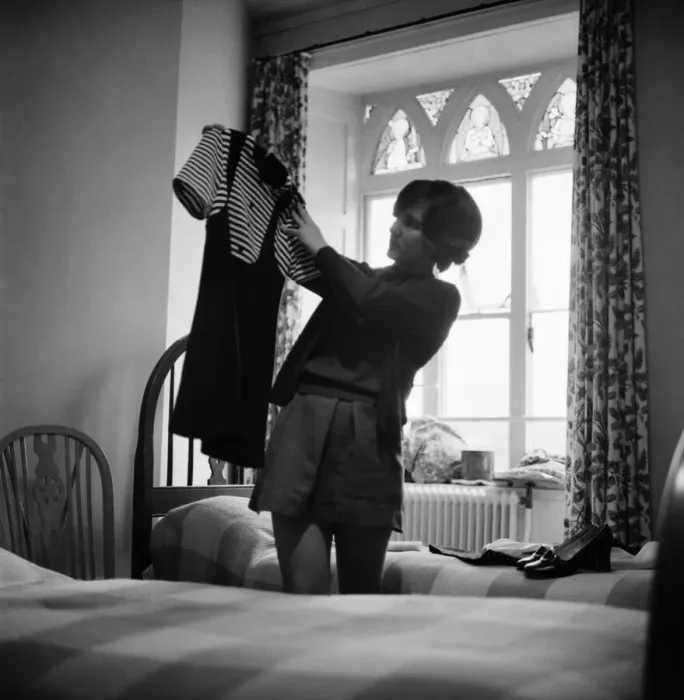 Framed Print : A vital moment in a young girls life - this week she leaves the school to start work