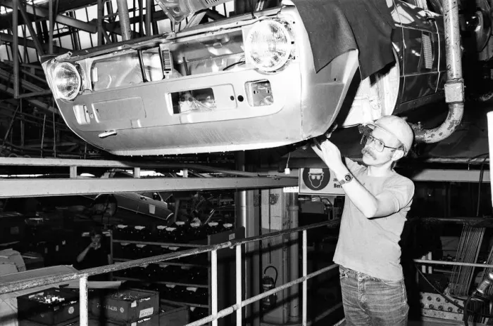 Framed Print : Volkswagen assembly line worker Peter Schredewitz at work in Wolfsburg, Germany