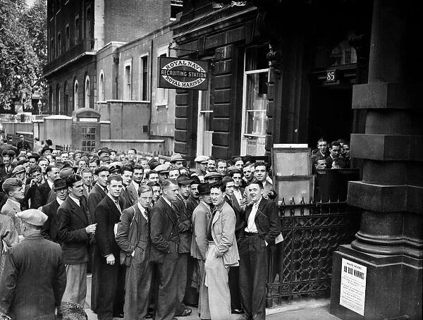 Volunteers line up outside a Royal Naval recruiting station at the outbreak of the Second