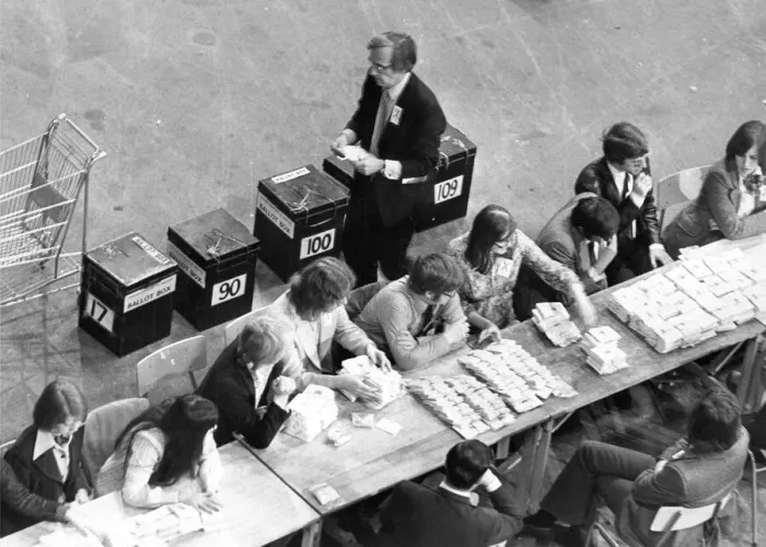 Framed Print : Votes already counted and stacked into neat bundles on one of the counting tables Framed Print : Votes already counted and stacked into neat bundles on one of the counting tables