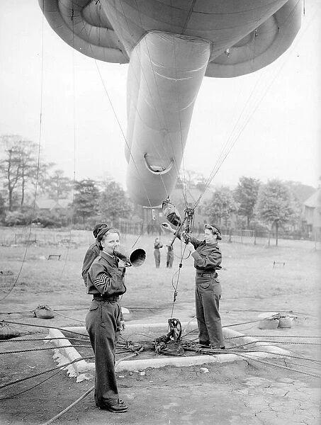 W. A. A. Fs manning the Balloon Barrage - July 1941 Women doing mens jobs during