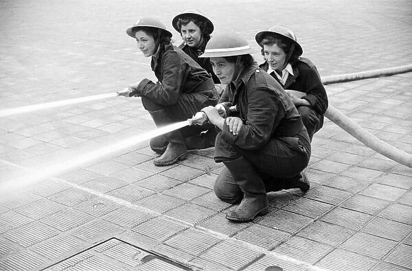 W. N. F. F - first pictures of Womens Fire Service Pump Crews - competition with