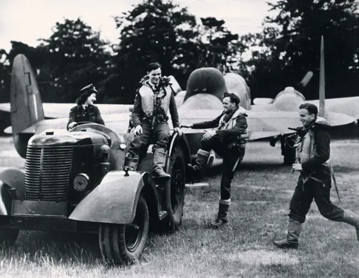 Framed Print : A Waaf driving a tractor tows a RAF Hudson bomber and its crew back to their dispersal Framed Print : A Waaf driving a tractor tows a RAF Hudson bomber and its crew back to their dispersal