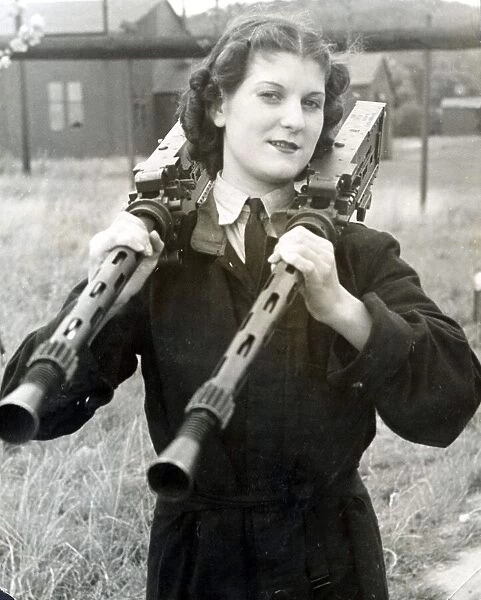 WaF with a couple of Browning machine-guns perched on her shoulders
