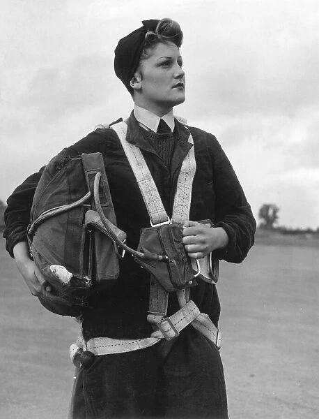 WaF Flight mechanic with parachute before a test flight at Trainer Station, South Cerney