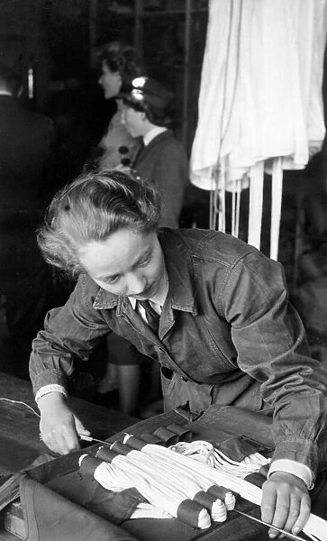WaF officer packing a parachute for RAF pilots to use during one of the bombing raids in