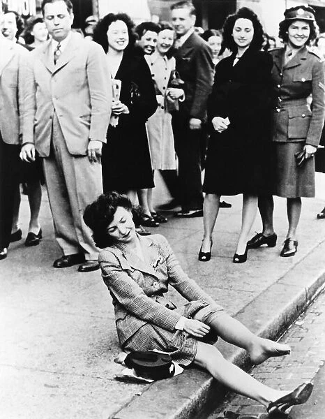 After waiting hours to buy nylons that went on sale post WW2 this young woman couldn