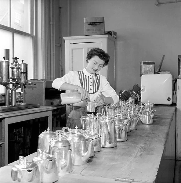 Waitress  /  woman seen here preparing pots of tea in a cafe. 1957 A17b-003