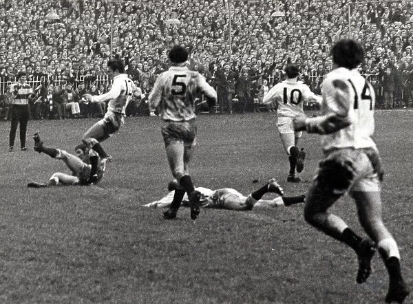 Wales v England, Cardiff Arms Park, 16th January 1971. John Bevan dives over for his try