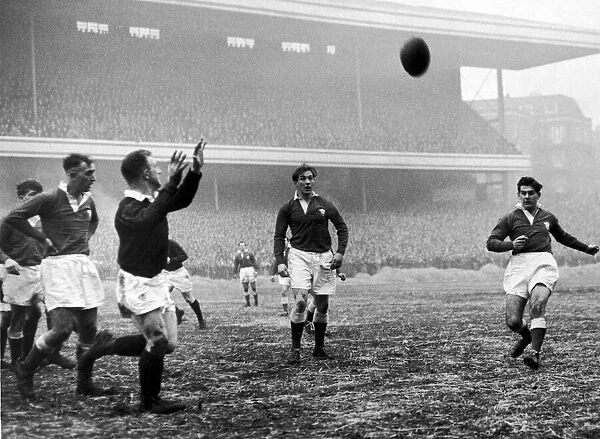 Wales v Scotland - 1956 - Rugby - Wales centre Malcolm Thomas clears to touch under