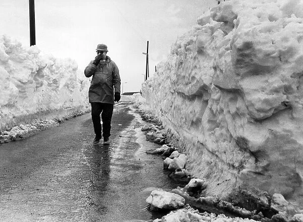 Walles of solid snow, taller than the average man, leading into Llantwit Major