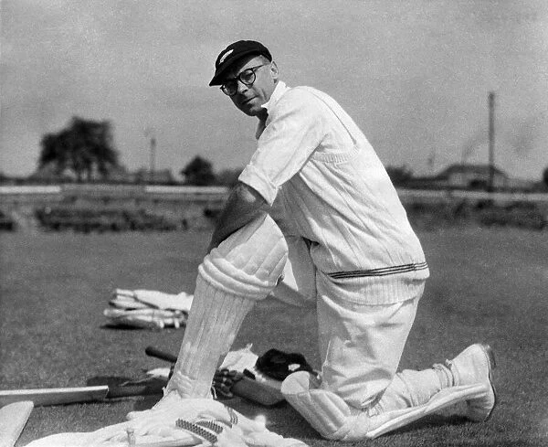 Walter Hadlee New Zealand captain puts on his pads. July 1949 P012505