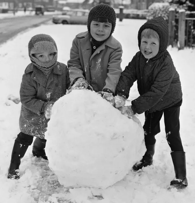 Framed Print : Do you want to build a snowman? Three children seen here in Reading take advantage of Framed Print : Do you want to build a snowman? Three children seen here in Reading take advantage of