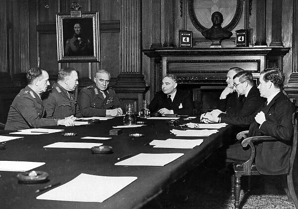 The War Council in session photographed in the Council Room at the War Office, L-R Sir W