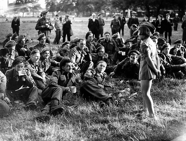 War: Invasion of France June 1944 10 years old Edna McCundle entertains the troops