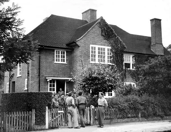War Prisoners, Italians at the gate of a house in Woodhall Gate, Pinner Wood Estate