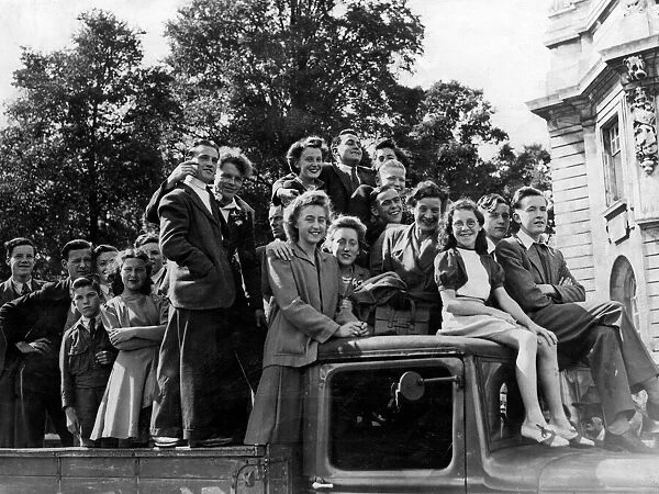 War - World War II - Yound people in Cardiff climb on board a lorry to use it as a