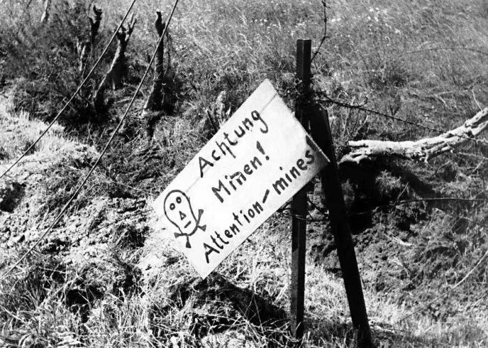 Framed Print : Warning of German minefield found by Canadian soldiers on arrival in France
