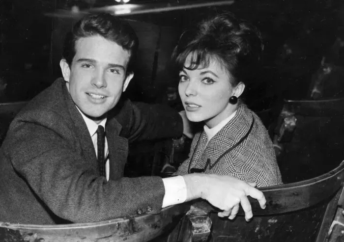 Framed Print : Warren Beatty and fiancee Joan Collins sitting in theatre - February 1961