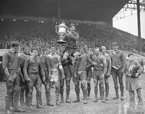 The Warrington captain Albert Naughton is chaired off the field by this teammates holding