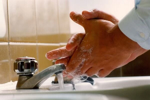 Someone washing their hands