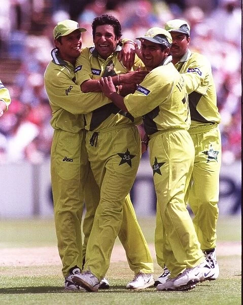 Wasim Akram is mobbed after getting the wicket June 1999 of Craig McMillan during