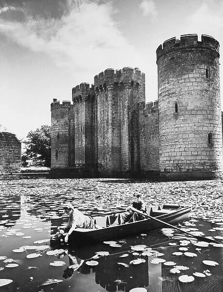 Water lillies in the moat surrounding Bodiam Castle. Circa 1945