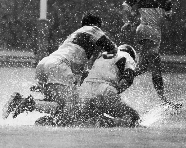 A water logged pitch at Wembley during the Leeds v Wakefield Trinity Rugby League Cup