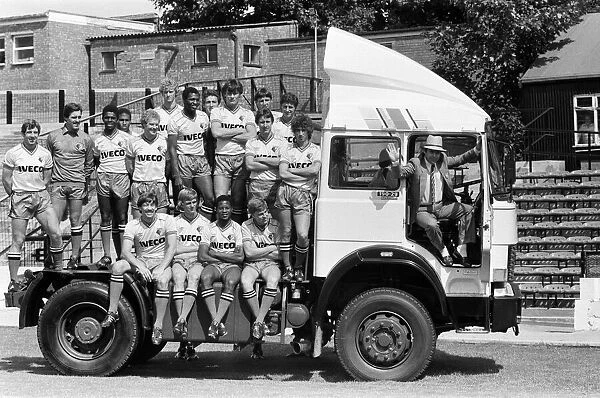 Watford FC chairman Elton John with Watford football team at a photocall