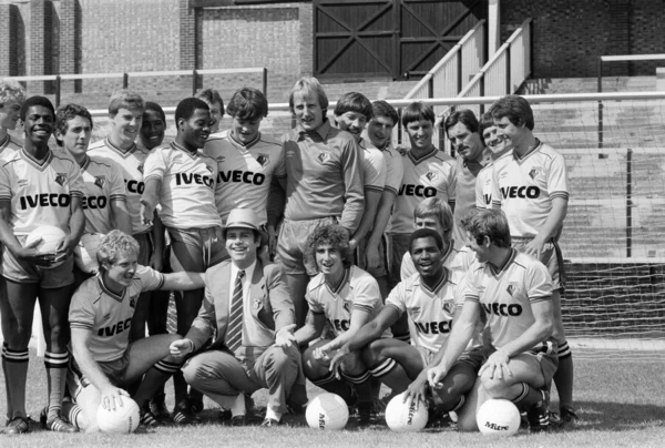 Watford FC chairman Elton John with Watford football team at a photocall