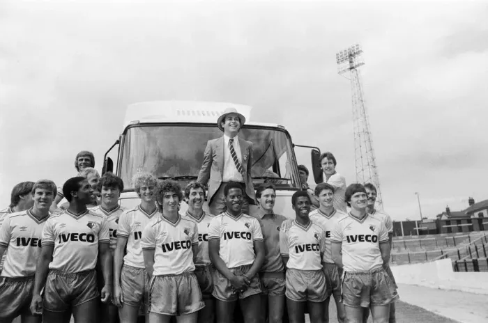 Framed Print : Watford FC chairman Elton John with Watford football team at a photocall