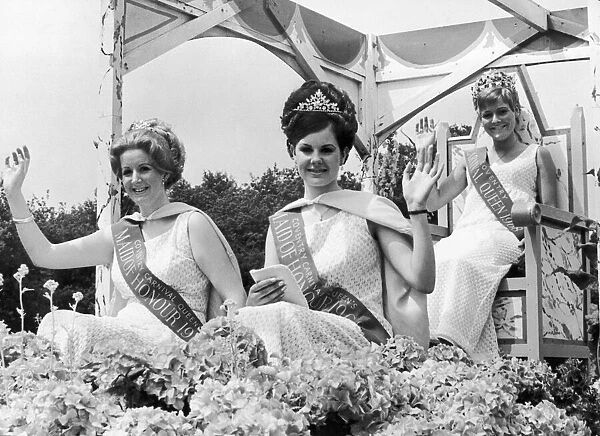 A wave from Carnival Queen Berenice Goodwin, from her float which headed the Coventry
