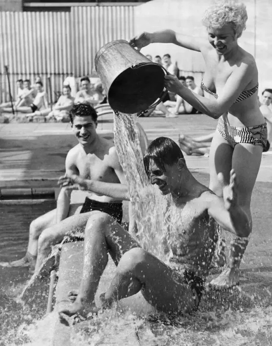 Framed Print : One way to cool off in the present heat wave is to have a bucket of cold water thrown Framed Print : One way to cool off in the present heat wave is to have a bucket of cold water thrown