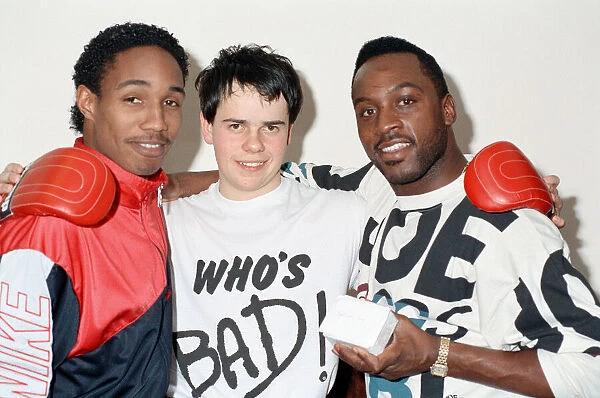 Former WBO middleweight champion Nigel Benn (right) with cousin Paul Ince (left