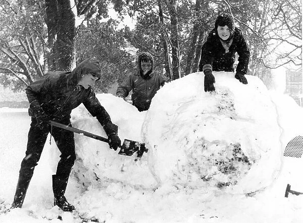 Weather - Snow - Three youngsters have a fine time as they enjoyed themselves in