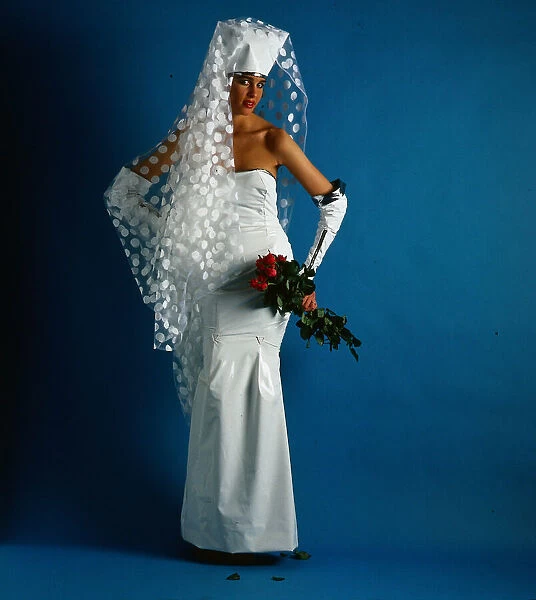 Wedding dress and fashion, June 1986 Model wearing PVC strapless dress