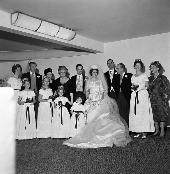 The wedding of Edwina Sandys and Piers Dixon. Standing to the left of Piers Dixon is Lady